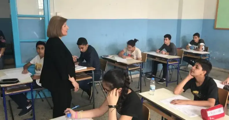 Teacher giving instructions about the Lebanese official exams from Annahar